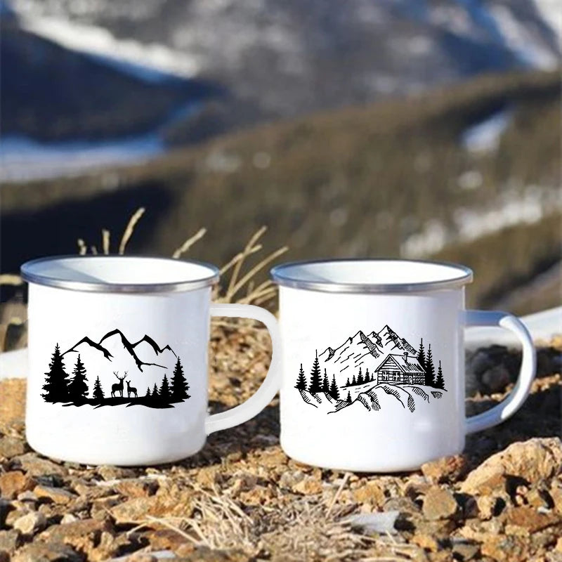 Two white enamel mugs with nature-themed designs