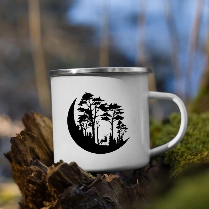 White mug with black forest design on a natural background
